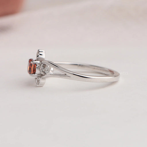 Side view of cushion cut cluster diamond ring center stone red color with VS clarity. Crafted with 14k white gold & set in split shank.