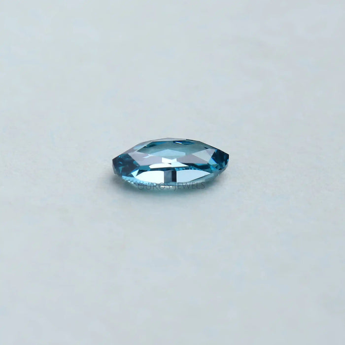 side view of 0.53 carat rose cut blue oval cut loose lab created diamond