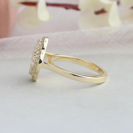 side view of round shaped lab diamond floral halo engagement ring gold